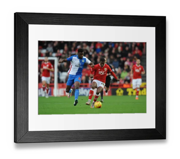 Framed Print : Bristol City's Kieran Agard Battles Past Hope Akpan for Ball Control Framed Print : Bristol City's Kieran Agard Battles Past Hope Akpan for Ball Control