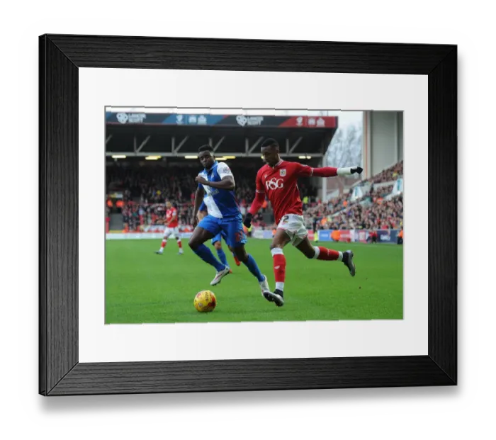 Framed Print : Kodjia Slips Past Akpan: A Pivotal Moment in the Bristol City vs Blackburn Rovers Championship Clash