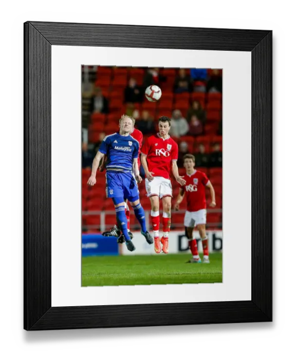 Framed Print : Intense Moment: Lloyd Humphris vs. James Morton in FA Youth Cup Third Round Clash at Ashton Gate Stadium Framed Print : Intense Moment: Lloyd Humphris vs. James Morton in FA Youth Cup Third Round Clash at Ashton Gate Stadium
