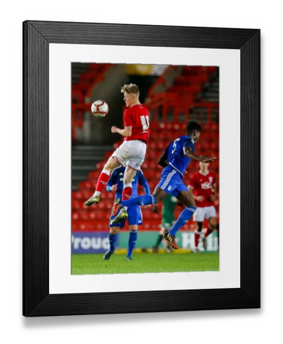 Framed Print : Clash in the Air: U18s of Bristol City and Cardiff City Battle at Ashton Gate