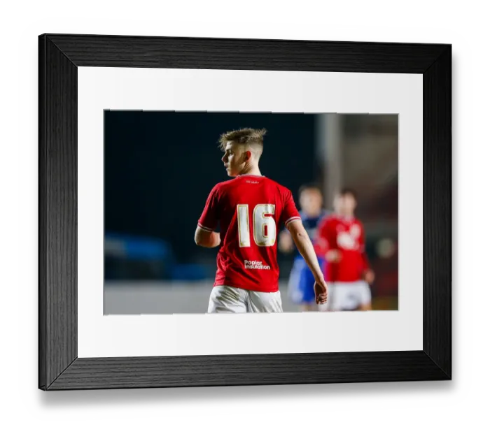 Framed Print : Bristol City U18s vs Cardiff City U18s: James Difford Watching Intently at Ashton Gate Stadium Framed Print : Bristol City U18s vs Cardiff City U18s: James Difford Watching Intently at Ashton Gate Stadium