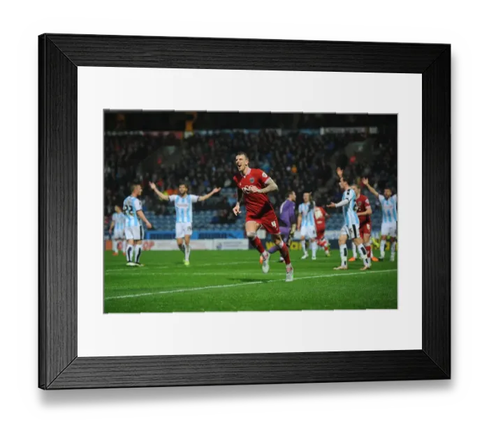 Framed Print : Aden Flint's Euphoric Goal Celebration: Huddersfield Town vs. Bristol City (Sky Bet Championship, December 12, 2015) Framed Print : Aden Flint's Euphoric Goal Celebration: Huddersfield Town vs. Bristol City (Sky Bet Championship, December 12, 2015)