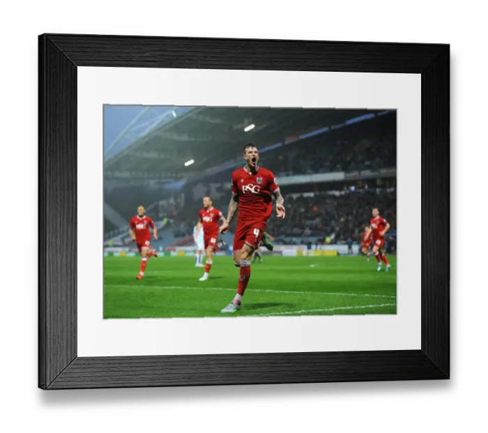 Framed Print : Aden Flint's Euphoric Goal Celebration: Huddersfield Town vs. Bristol City, Sky Bet Championship (December 12, 2015)