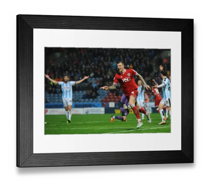 Framed Print : Aden Flint's Euphoric Goal Celebration: Huddersfield vs. Bristol City, Sky Bet Championship (December 12, 2015)