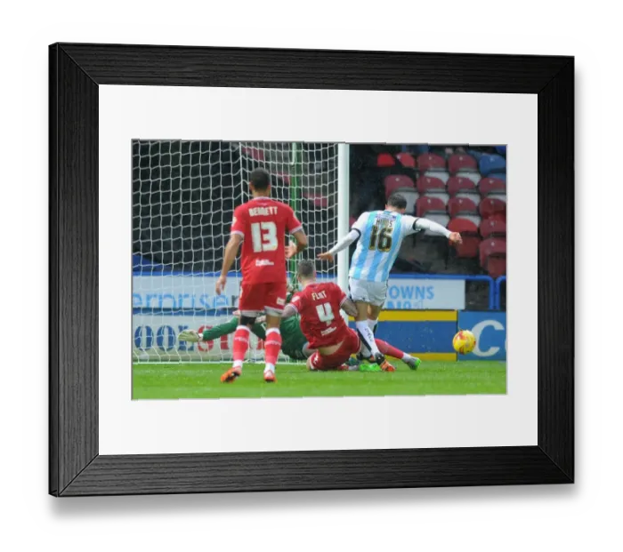 Framed Print : Aden Flint Tackles Emyr Huws in Intense Championship Clash: Huddersfield Town vs. Bristol City Framed Print : Aden Flint Tackles Emyr Huws in Intense Championship Clash: Huddersfield Town vs. Bristol City