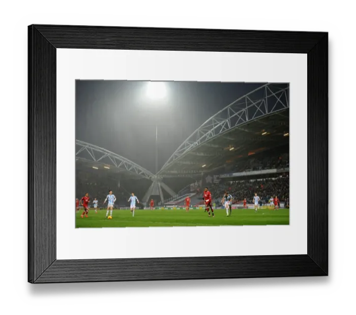 Framed Print : Huddersfield vs. Bristol City: A Rainy Championship Clash at John Smith's Stadium