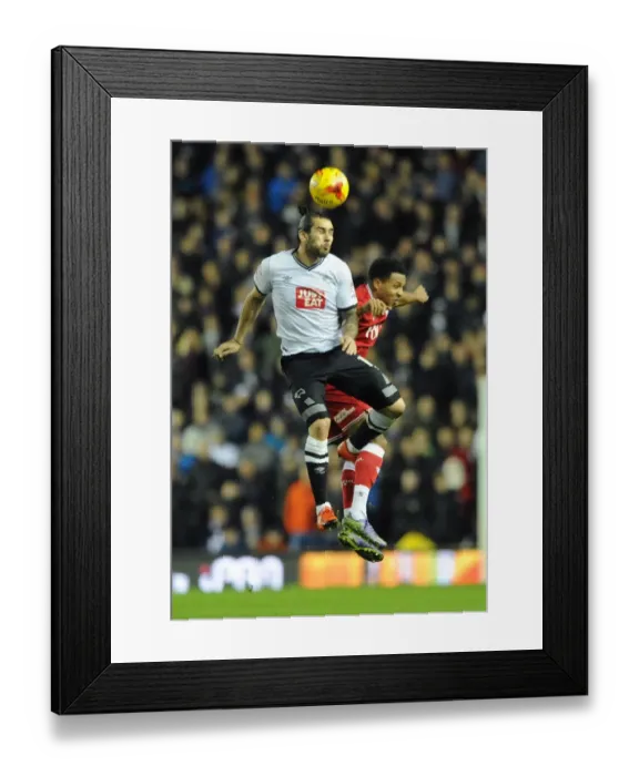 Framed Print : Bristol City's Korey Smith Battles for a Header Against Derby County's Bradley Johnson Framed Print : Bristol City's Korey Smith Battles for a Header Against Derby County's Bradley Johnson