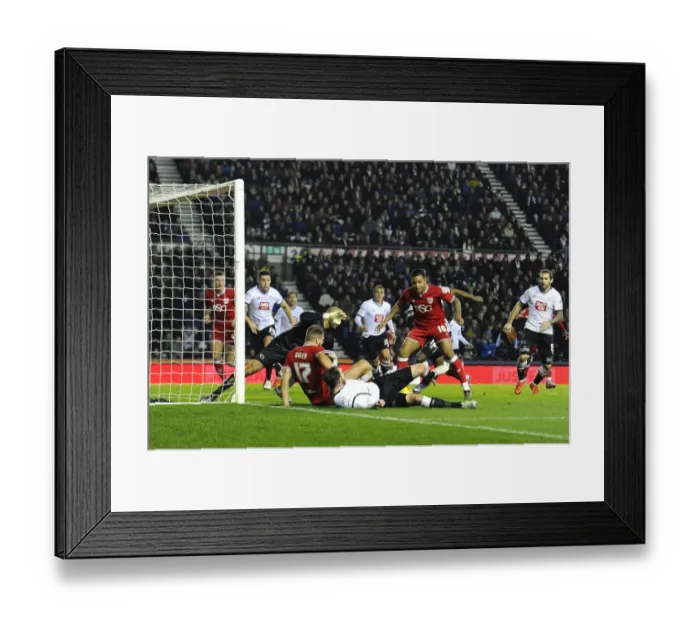 Framed Print : Bristol City's Nathan Baker Tries to Score in Derby County Showdown Framed Print : Bristol City's Nathan Baker Tries to Score in Derby County Showdown