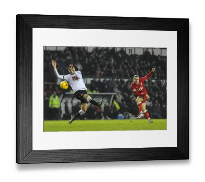 Framed Print : Bristol City's Luke Freeman Aims for the Net in Derby County Showdown Framed Print : Bristol City's Luke Freeman Aims for the Net in Derby County Showdown