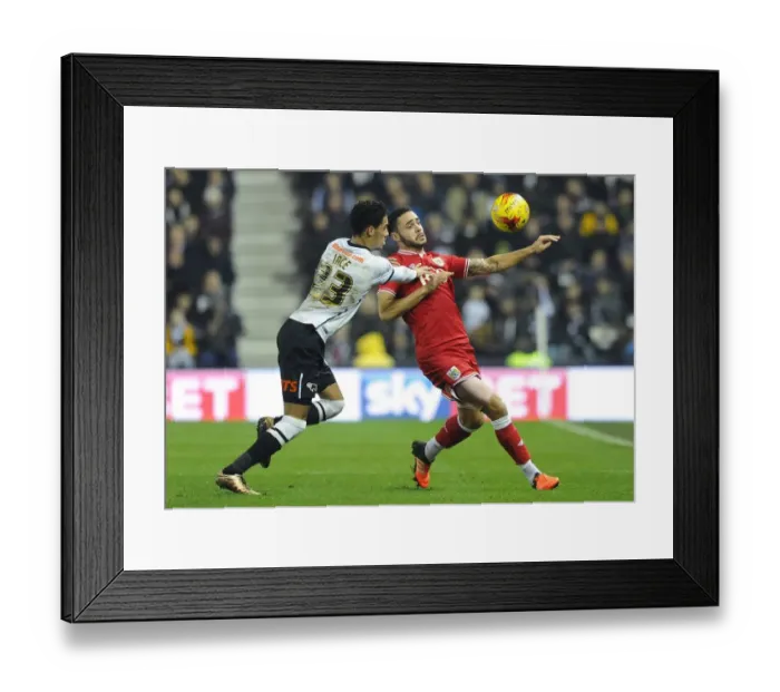 Framed Print : Derby County vs. Bristol City: Intense Battle Between Derrick Williams and Thomas Ince Framed Print : Derby County vs. Bristol City: Intense Battle Between Derrick Williams and Thomas Ince