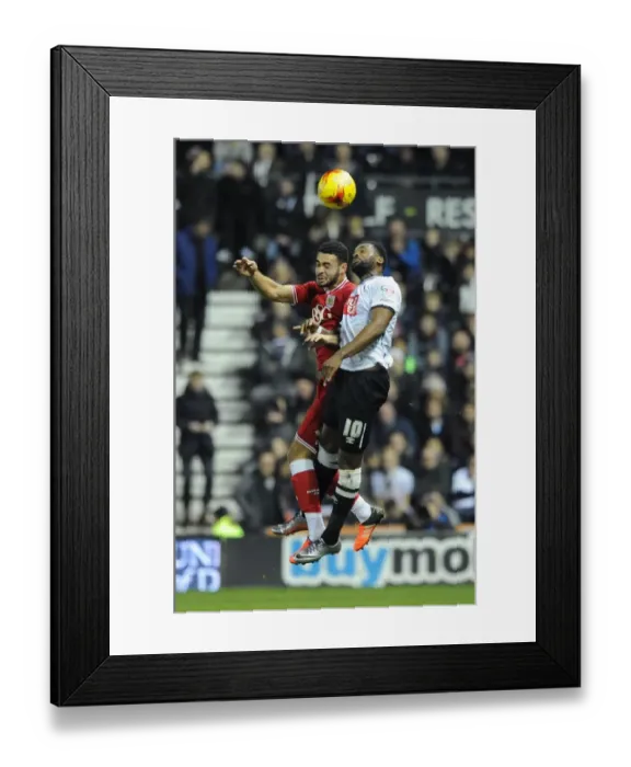 Framed Print : Derby County vs. Bristol City: Intense Clash Between Derrick Williams and Darren Bent Framed Print : Derby County vs. Bristol City: Intense Clash Between Derrick Williams and Darren Bent