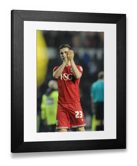 Framed Print : Bristol City's Joe Bryan Applauding Fans Amidst the Derby County Rivalry Framed Print : Bristol City's Joe Bryan Applauding Fans Amidst the Derby County Rivalry