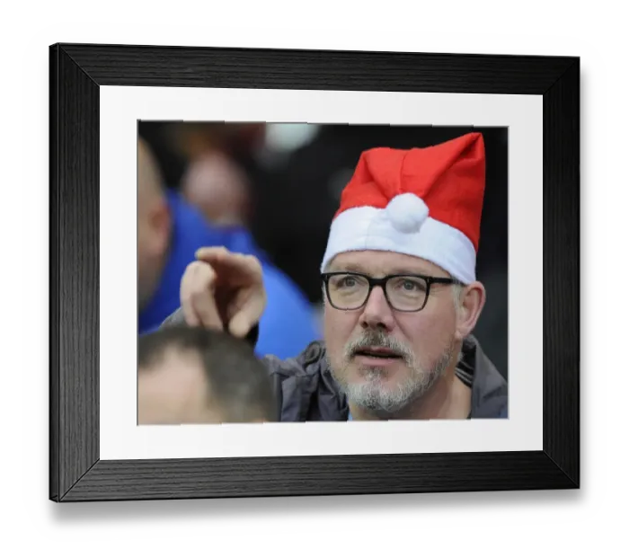 Framed Print : Bristol City Fan in Christmas Hat Celebrates at Ashton Gate Stadium during Sky Bet Championship Match Framed Print : Bristol City Fan in Christmas Hat Celebrates at Ashton Gate Stadium during Sky Bet Championship Match