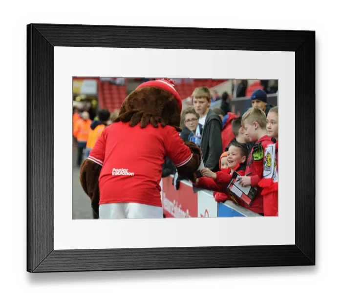 Framed Print : Bristol City Fans Embrace Scrumpy Mascot at Ashton Gate during Sky Bet Championship Match against QPR (19 / 12 / 2015) Framed Print : Bristol City Fans Embrace Scrumpy Mascot at Ashton Gate during Sky Bet Championship Match against QPR (19 / 12 / 2015)