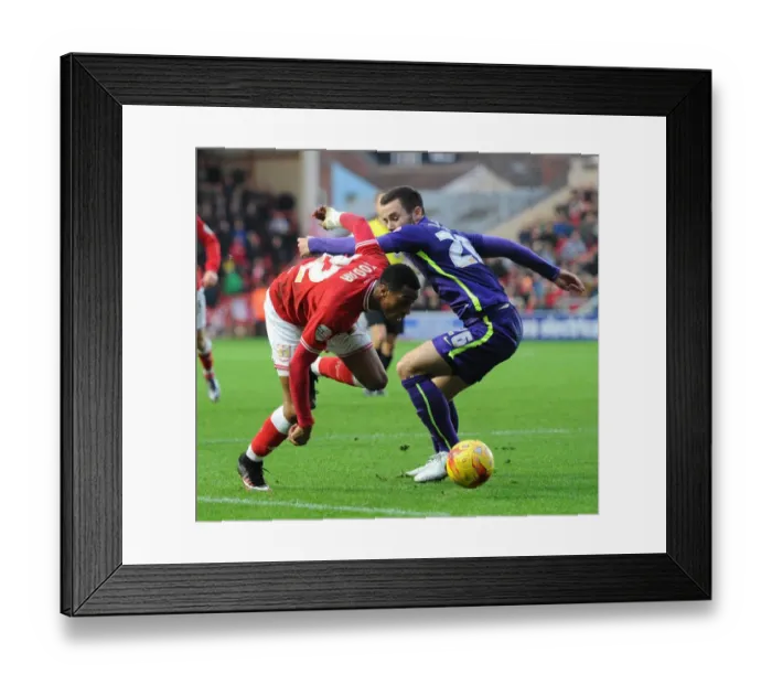 Framed Print : Jonathan Kodjia Slips Past Harry Lennon: A Pivotal Moment in the Bristol City vs Charlton Athletic Championship Clash (December 2015)