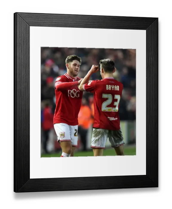 Framed Print : Bristol City Celebrate Win Against Middlesbrough: Wes Burns and Joe Bryan Rejoice on Pitch Framed Print : Bristol City Celebrate Win Against Middlesbrough: Wes Burns and Joe Bryan Rejoice on Pitch