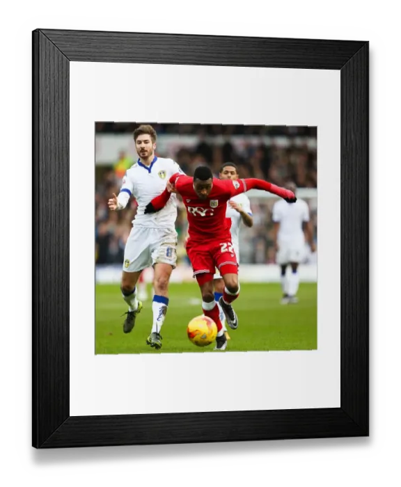 Framed Print : Jonathan Kodjia Dodges Luke Murphy: Thrilling Moment from Leeds United vs. Bristol City Championship Clash