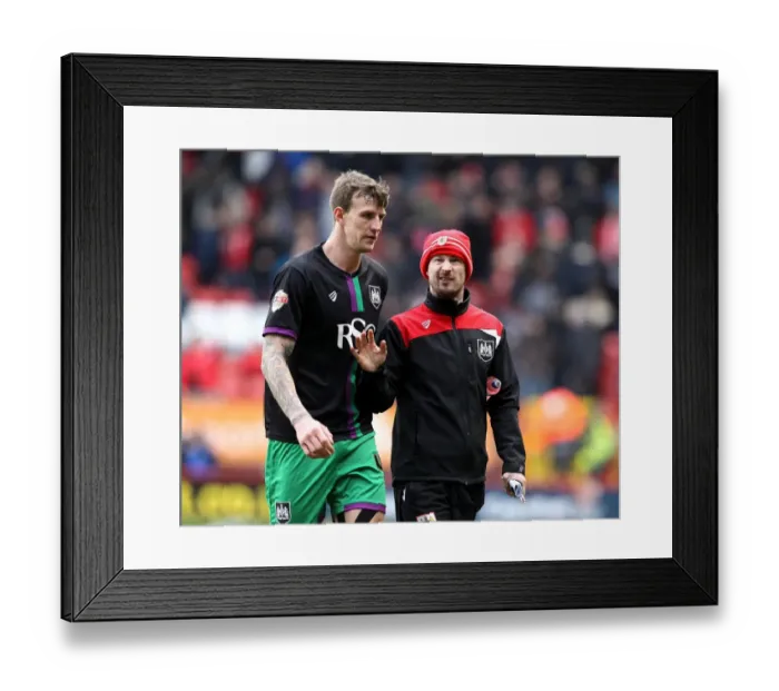 Framed Print : Wade Elliott Consults Aden Flint: Intense Moment at The Valley during Charlton Athletic vs. Bristol City (Sky Bet Championship)