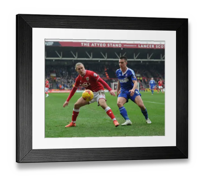 Framed Print : Battling for Supremacy: Luke Freeman vs. Jonas Knudsen in the Championship Clash between Bristol City and Ipswich Town Framed Print : Battling for Supremacy: Luke Freeman vs. Jonas Knudsen in the Championship Clash between Bristol City and Ipswich Town
