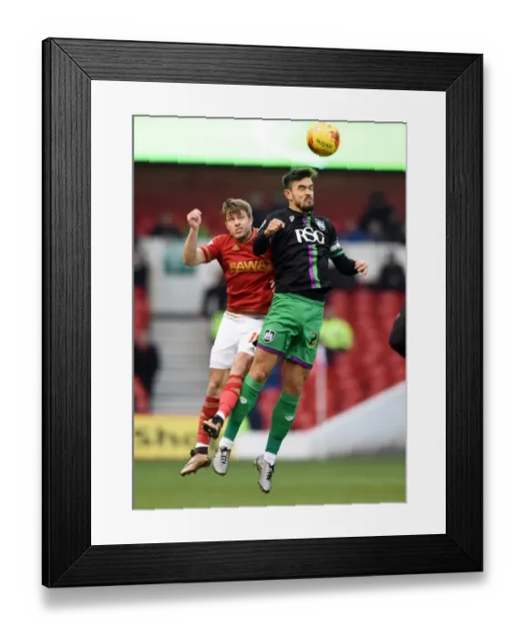 Framed Print : Maron Pack vs Jamie Ward: Battle for Supremacy in Nottingham Forest vs Bristol City Championship Clash