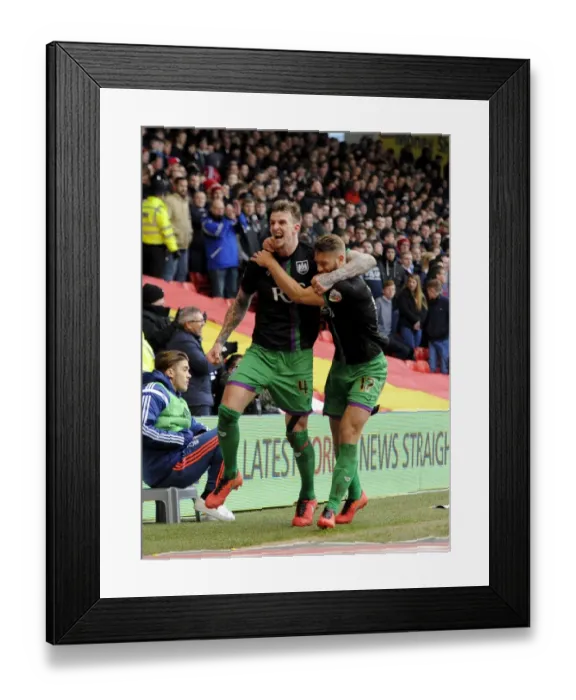 Framed Print : Jubilant Moment: Aden Flint and Nathan Baker's Euphoric Celebration after Bristol City's Victory at Nottingham Forest (2016)