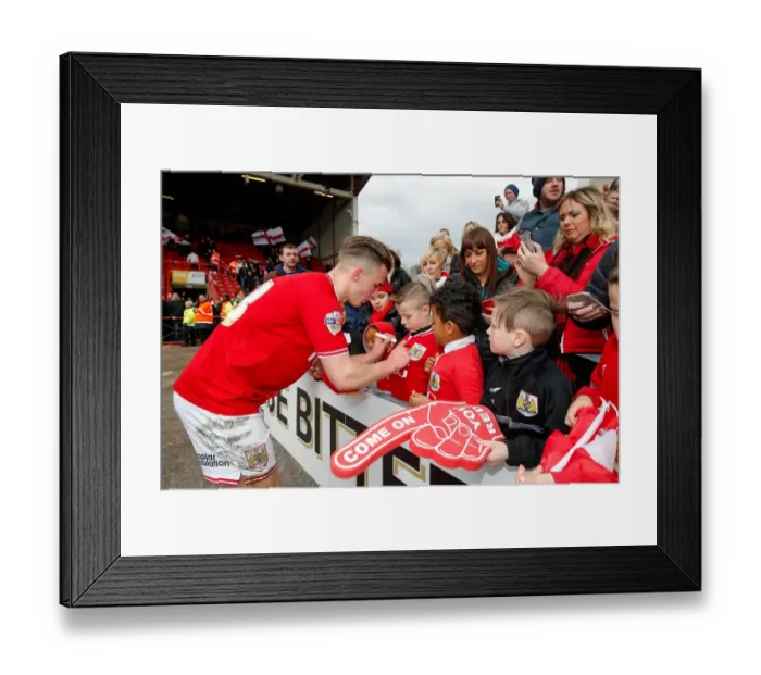 Framed Print : Joe Bryan of Bristol City Greets Young Fans After Championship Match Against Cardiff City