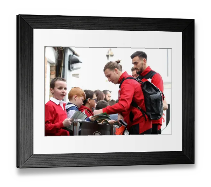 Framed Print : Bristol City's Luke Freeman Signs Autographs at Craven Cottage after Fulham Match Framed Print : Bristol City's Luke Freeman Signs Autographs at Craven Cottage after Fulham Match