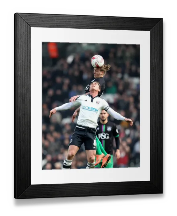 Framed Print : Bristol City's Luke Freeman Outmuscles Fulham's Scott Parker for a Header in Sky Bet Championship Clash