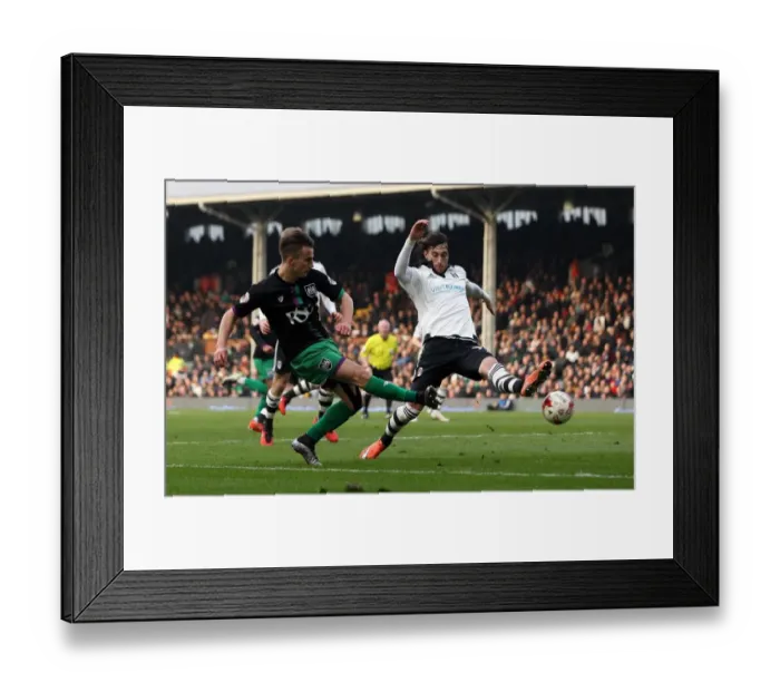 Framed Print : Bristol City's Joe Bryan Sends a Cross Past Fulham's Fernando Amorebieta in Championship Clash Framed Print : Bristol City's Joe Bryan Sends a Cross Past Fulham's Fernando Amorebieta in Championship Clash