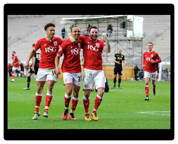 Championship Triumph: Odemwingie, Reid, and Tomlin's Euphoric Reaction after Goal vs. Bolton Wanderers (19 March 2016)