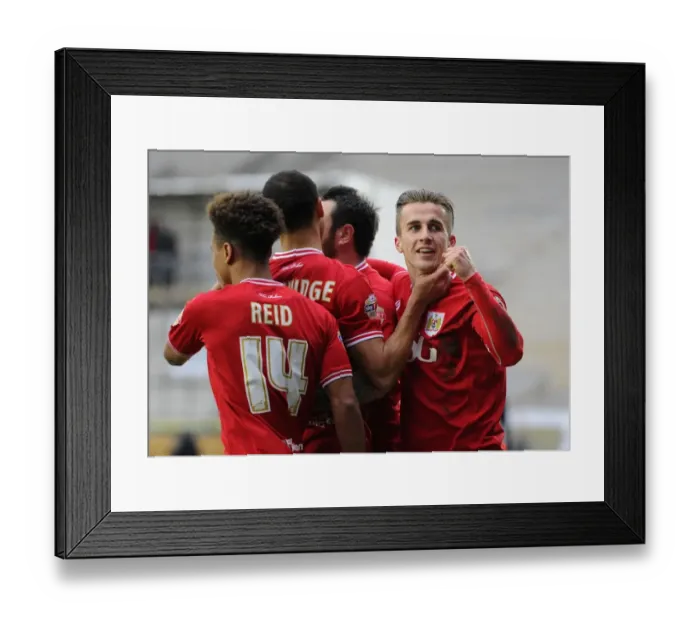 Framed Print : Bristol City Football Club: Championship Victory Celebration - Odemwingie, Reid, Bryan, and Tomlin Rejoice After Goal Against Bolton Wanderers (19 March 2016)