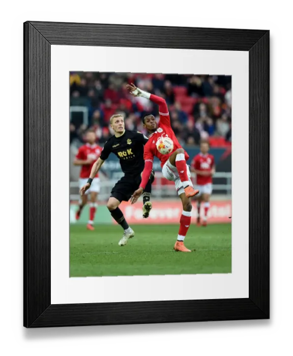 Framed Print : Bristol City's Jonathan Kodjia Fights for Supremacy in the Sky Bet Championship Clash Against Bolton Wanderers Framed Print : Bristol City's Jonathan Kodjia Fights for Supremacy in the Sky Bet Championship Clash Against Bolton Wanderers