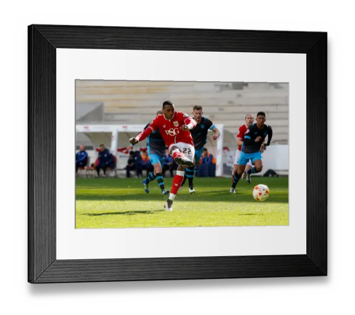 Framed Print : Jonathan Kodjia's Penalty Seals 4-0 Lead for Bristol City Against Sheffield Wednesday