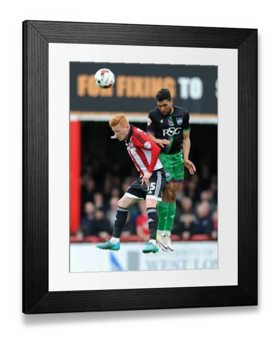 Framed Print : Bristol City's Scott Golbourne and Brentford's Ryan Woods Battle for Aerial Supremacy in Championship Clash Framed Print : Bristol City's Scott Golbourne and Brentford's Ryan Woods Battle for Aerial Supremacy in Championship Clash