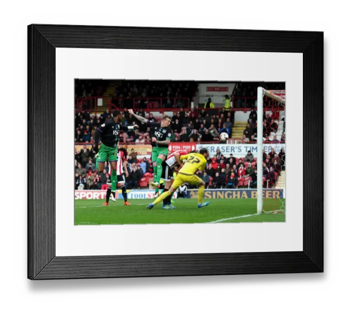 Framed Print : Aden Flint Charges Towards Brentford Goal: Sky Bet Championship Clash Between Brentford and Bristol City Framed Print : Aden Flint Charges Towards Brentford Goal: Sky Bet Championship Clash Between Brentford and Bristol City