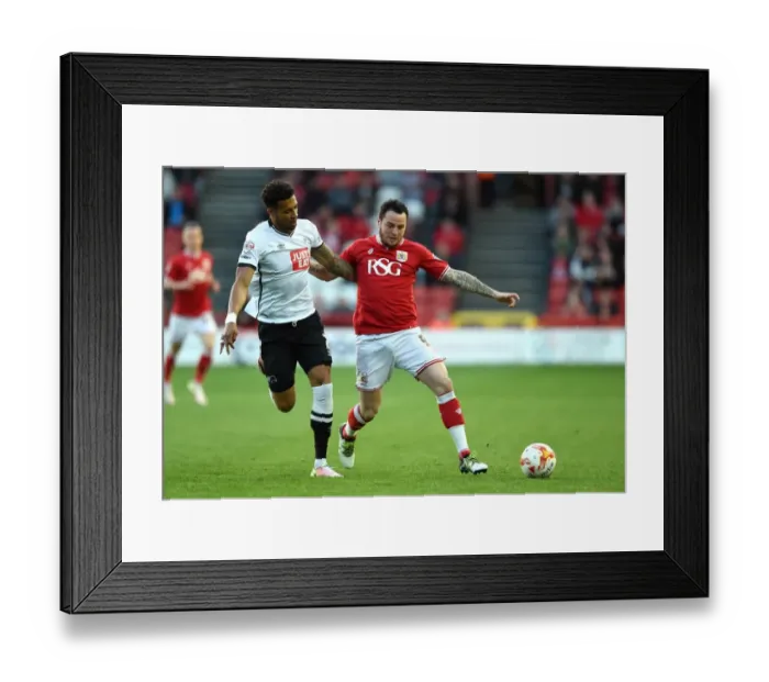 Framed Print : Battling Rivals: Lee Tomlin vs Cyrus Christie in the 2016 Championship Clash (Bristol City v Derby County)