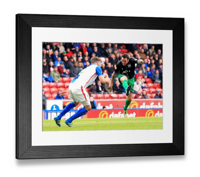 Framed Print : Bristol City's Lee Tomlin Unleashes a Shot at Blackburn Rovers in Championship Clash