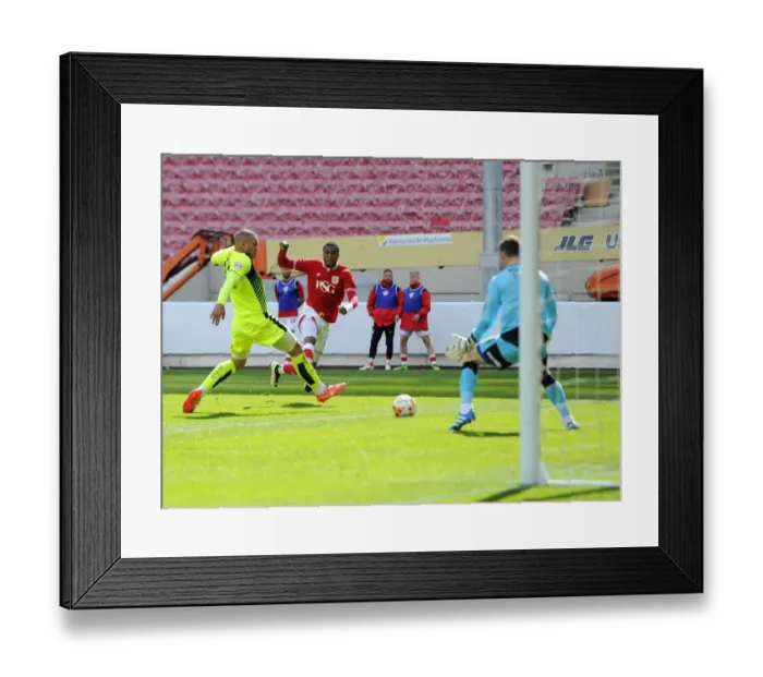 Framed Print : Bristol City's Jonathan Kodjia Scores the Winning Goal Against Huddersfield Town in Sky Bet Championship Match at Ashton Gate Stadium (30 / 04 / 2016) Framed Print : Bristol City's Jonathan Kodjia Scores the Winning Goal Against Huddersfield Town in Sky Bet Championship Match at Ashton Gate Stadium (30 / 04 / 2016)