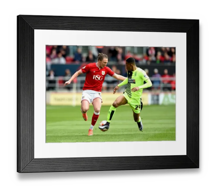 Framed Print : Championship Showdown: Luke Ayling vs. Rajiv van La Parra at Ashton Gate - A Battle for Supremacy