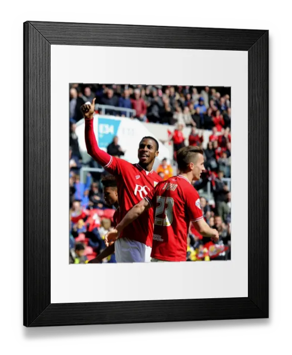 Framed Print : Jonathan Kodjia's Thrilling Goal Celebration: Bristol City vs. Huddersfield Town in Sky Bet Championship Framed Print : Jonathan Kodjia's Thrilling Goal Celebration: Bristol City vs. Huddersfield Town in Sky Bet Championship