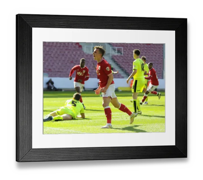 Framed Print : Bristol City Celebrates Promotion: Joe Bryan's Goal Against Huddersfield Town (30.04.2016) Framed Print : Bristol City Celebrates Promotion: Joe Bryan's Goal Against Huddersfield Town (30.04.2016)