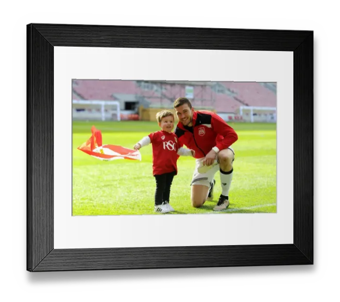 Framed Print : Bristol City's Richard O'Donnell Celebrates with Son after Championship Win vs. Huddersfield Town (30 / 04 / 2016) Framed Print : Bristol City's Richard O'Donnell Celebrates with Son after Championship Win vs. Huddersfield Town (30 / 04 / 2016)
