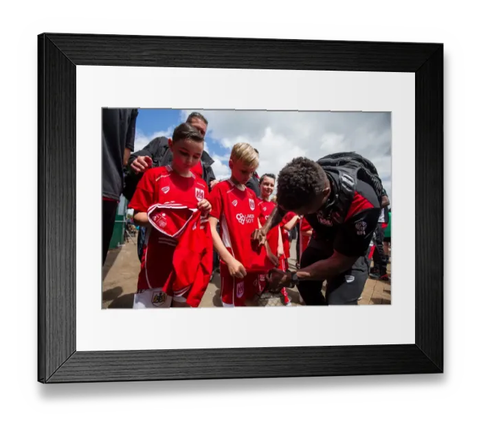Framed Print : Bristol City's Kieran Agard Greets Fans at Hengrove Athletic Pre-Season Match Framed Print : Bristol City's Kieran Agard Greets Fans at Hengrove Athletic Pre-Season Match