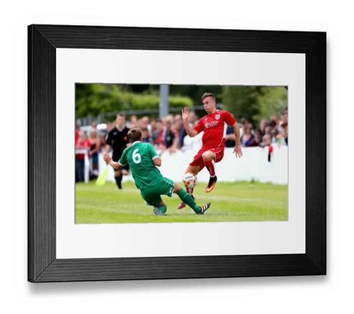 Framed Print : Bristol City's Joe Bryan Tackled in Pre-season Friendly Against Hengrove Athletic Framed Print : Bristol City's Joe Bryan Tackled in Pre-season Friendly Against Hengrove Athletic