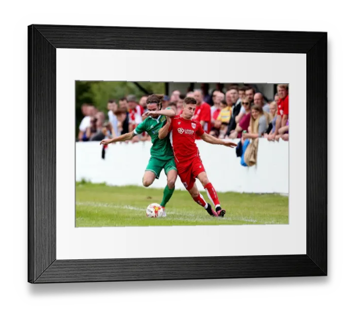 Framed Print : Bristol City's Joe Bryan Faces Off Against Hengrove Athletic's Asa White in Pre-Season Friendly