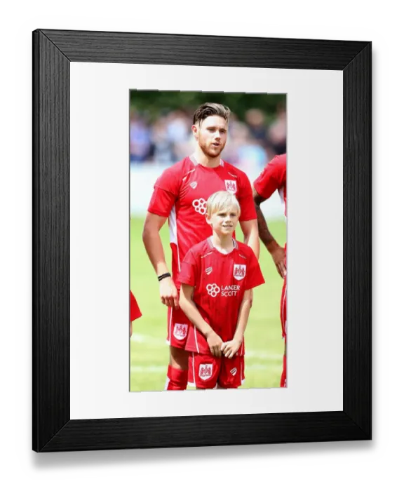 Framed Print : Bristol City FC: Wes Burns and Mascot Prepare for Pre-Season Friendly against Hengrove Athletic