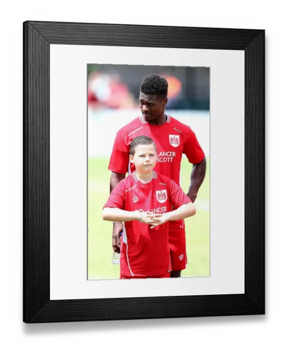 Framed Print : Bristol City FC: Kieran Agard and Mascot Prepare for Pre-Season Friendly at Hengrove Athletic