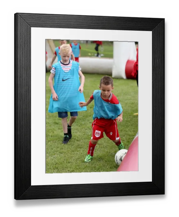Framed Print : Bristol City FC: Engaging Fans with Community Foundation Activities at Hengrove Athletic Pre-Season Friendly