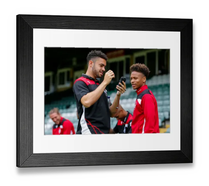 Framed Print : Bristol City FC: Derrick Williams and Bobby Reid Watch on during Pre-Season Friendly at Huish Park Framed Print : Bristol City FC: Derrick Williams and Bobby Reid Watch on during Pre-Season Friendly at Huish Park