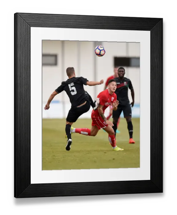Framed Print : Battling for Control: Josh Brownhill vs. Ruben Perez in Granada's Pre-season Clash with Bristol City Framed Print : Battling for Control: Josh Brownhill vs. Ruben Perez in Granada's Pre-season Clash with Bristol City